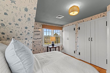 Eastham Cape Cod vacation rental - Charming upstairs queen bedroom with playful coastal wallpaper