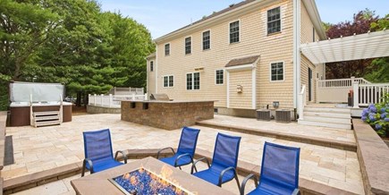 Mashpee Cape Cod vacation rental - Fire pit on a great back yard area