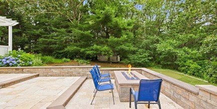 Mashpee Cape Cod vacation rental - Fire pit on a great back yard area