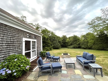 Brewster Cape Cod vacation rental - Patio with Seating and Firepit