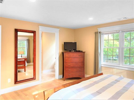 East Harwich Cape Cod vacation rental - 2nd floor bedroom with a Queen bed, TV, and access to the 2nd floor full bathroom