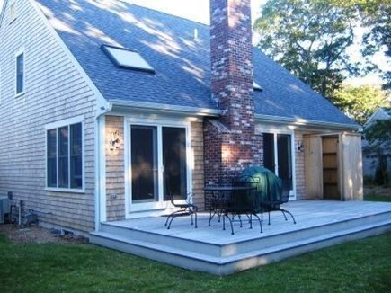 East Harwich Cape Cod vacation rental - Back deck with outdoor seating