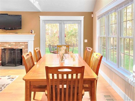 East Harwich Cape Cod vacation rental - Open dining with French doors to the deck