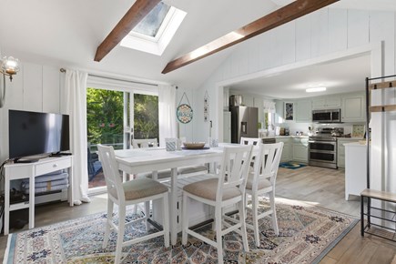 Mid-Cape - Yarmouth Cape Cod vacation rental - Dining table seats six and flows easily to kitchen.