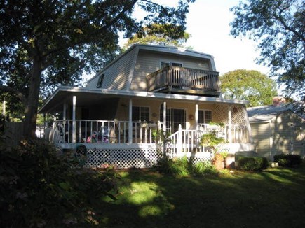 Hyannis Cape Cod vacation rental - Backyard and porch, and upper deck.