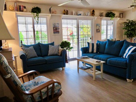 Hyannis Cape Cod vacation rental - Living room and sliding door to porch.