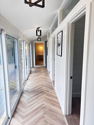 New Seabury Cape Cod vacation rental - Main hallway - please note small step-ups into bedrooms