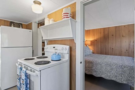 Orleans Cape Cod vacation rental - Stove with first floor bedroom right off the kitchen