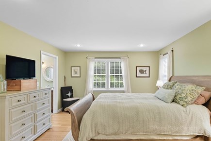 Brewster Cape Cod vacation rental - 1st floor primary bedroom with queen bed.
