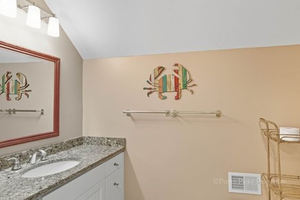 Brewster Cape Cod vacation rental - A shared full bathroom serves the upstairs guest room.
