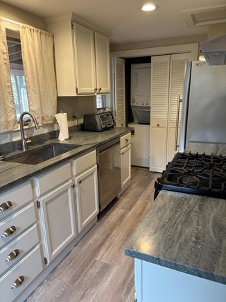 Barnstable Cape Cod vacation rental - Kitchen with washer and dryer in closet