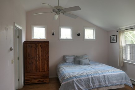 Eastham Cape Cod vacation rental - Primary bedroom with king size bed and en suite bathroom