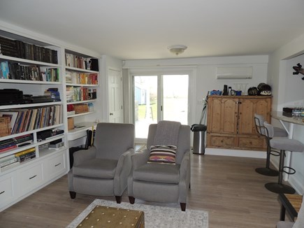 East Falmouth Cape Cod vacation rental - Ground floor great room (2 of 2) w/ bar/sink serving area on left