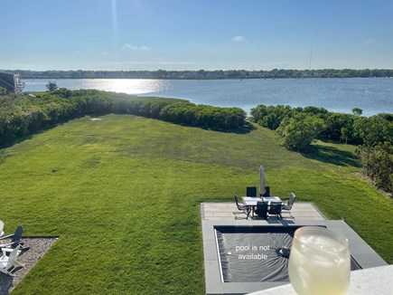 East Falmouth Cape Cod vacation rental - Expansive backyard for family fun, leads to private beach!