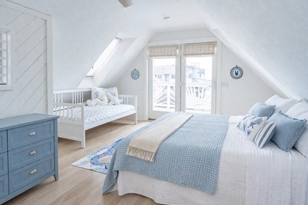Plymouth, White Horse Beach MA vacation rental - Master bedroom with balcony access, ocean view & airy loft feel