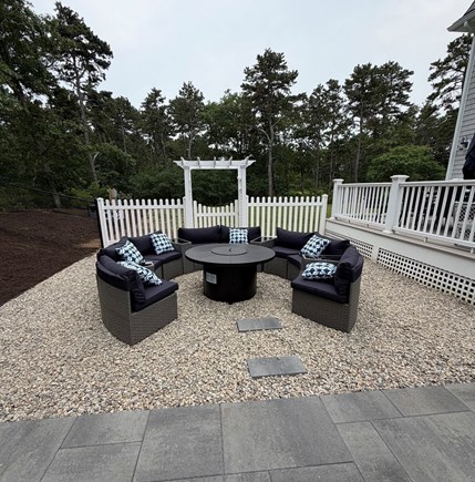Harwich Cape Cod vacation rental - Gather around the firepit.
