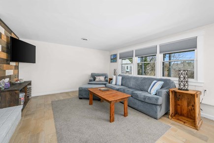Eastham Cape Cod vacation rental - Spacious living room with seating and Tv