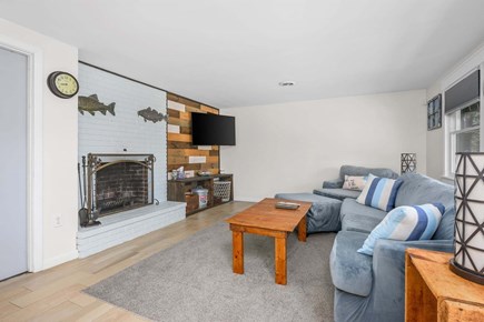 Eastham Cape Cod vacation rental - Spacious living room with seating and Tv