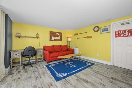 Eastham Cape Cod vacation rental - family room with seating and remote work area
