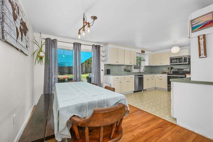 Eastham Cape Cod vacation rental - Dining area with view of kitchen