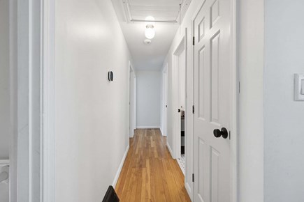 Eastham Cape Cod vacation rental - Hallway leading to sleeping accommodations and bathroom