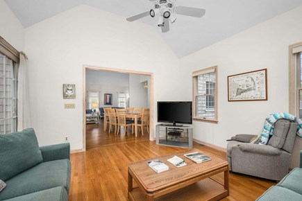 Dennis Cape Cod vacation rental - Livingroom with view of the dining area and tv