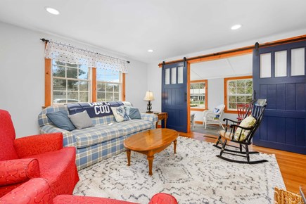 Osterville Cape Cod vacation rental - Living room with an open view into the sunroom