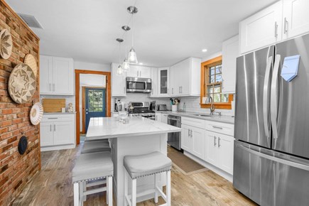 Osterville Cape Cod vacation rental - Modern kitchen with sleek finishes and updated appliances