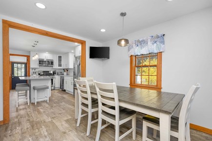 Osterville Cape Cod vacation rental - View into the kitchen from the dining area, offering a bright, open flow between spaces