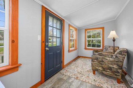 Osterville Cape Cod vacation rental - One of many comfortable seating options in the sunroom