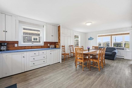 Bourne, Buzzards Bay Cape Cod vacation rental - Dining area within the kitchen, offering a convenient and open space for meals while maintaining easy flow between cooking and dining.