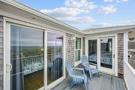 Bourne, Buzzards Bay Cape Cod vacation rental - Balcony with seating, providing a comfortable outdoor space to relax, enjoy fresh air, and take in the surrounding views.