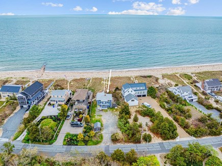 Bourne, Buzzards Bay Cape Cod vacation rental - Aerial view of the property showcasing the home and nearby beach