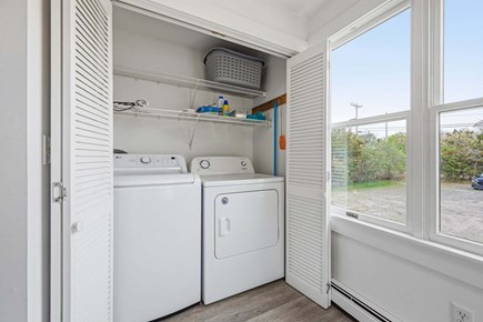 Bourne, Buzzards Bay Cape Cod vacation rental - Washer and dryer located in front of the entry, providing convenient in-home laundry access in a practical and easily reachable location.