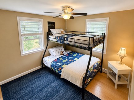 East Falmouth Cape Cod vacation rental - Bunk beds with trundle underneath - TV in closet. 1st Floor