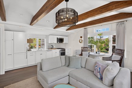 Provincetown Cape Cod vacation rental - Open-concept living room, dining room, and kitchen<br/>