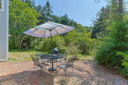 Truro Cape Cod vacation rental - Outside Patio area, with fire put in yard and outdoor shower.
