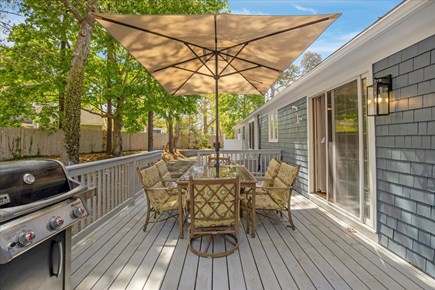 Brewster Cape Cod vacation rental - Deck with dining, gas grill & shade umbrella