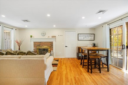 Brewster Cape Cod vacation rental - Open-concept living & dining with breakfast bar