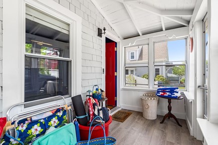 Onset MA vacation rental - Front Door with beach accessories (towels, toys, lotions, chairs)