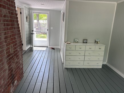 West Dennis Cape Cod vacation rental - Bonus room looking to backyard. Half bath is behind the dresser