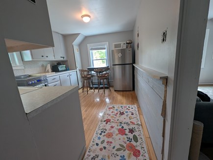 West Falmouth Cape Cod vacation rental - View from hall to kitchen.