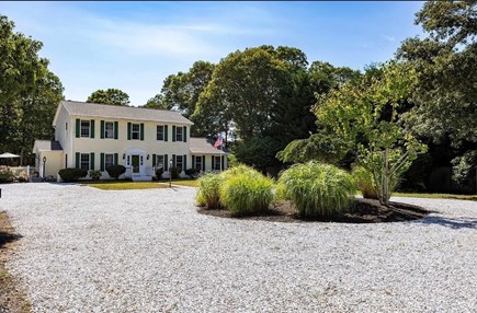 Harwich Cape Cod vacation rental - Front view of the house. Highlighting ample amount of parking.