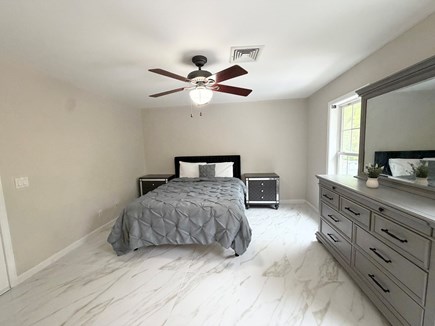 Harwich Cape Cod vacation rental - A large, inviting room equipped with a queen-size bed.