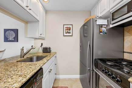 New Seabury, Mashpee Cape Cod vacation rental - Fully equipped kitchen with all essential cookware and utensils, designed for convenient home cooking and entertaining.