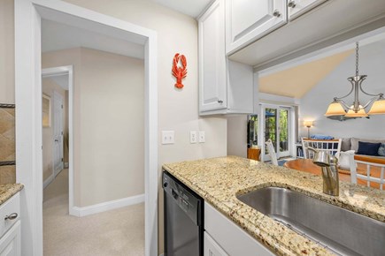 New Seabury, Mashpee Cape Cod vacation rental - Dishwasher-equipped kitchen, offering added convenience for easy cleanup after meals and effortless everyday living.