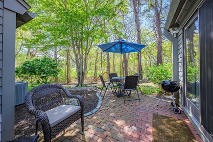 New Seabury, Mashpee Cape Cod vacation rental - Patio providing a peaceful space to unwind, offering a relaxing outdoor setting perfect for enjoying quiet moments and fresh air.