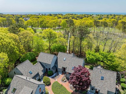 New Seabury, Mashpee Cape Cod vacation rental - Aerial view of the property and surrounding area, showcasing the home’s setting within the neighborhood