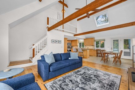 West Yarmouth Cape Cod vacation rental - Cathedral ceilings with exposed beams overlooking the living room, dining area, and kitchen