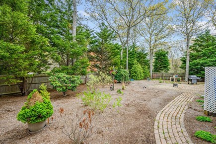 West Yarmouth Cape Cod vacation rental - Walkway to patio